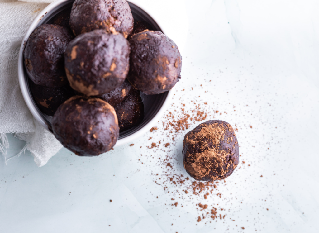 chocolate energy protein balls in bowl on table