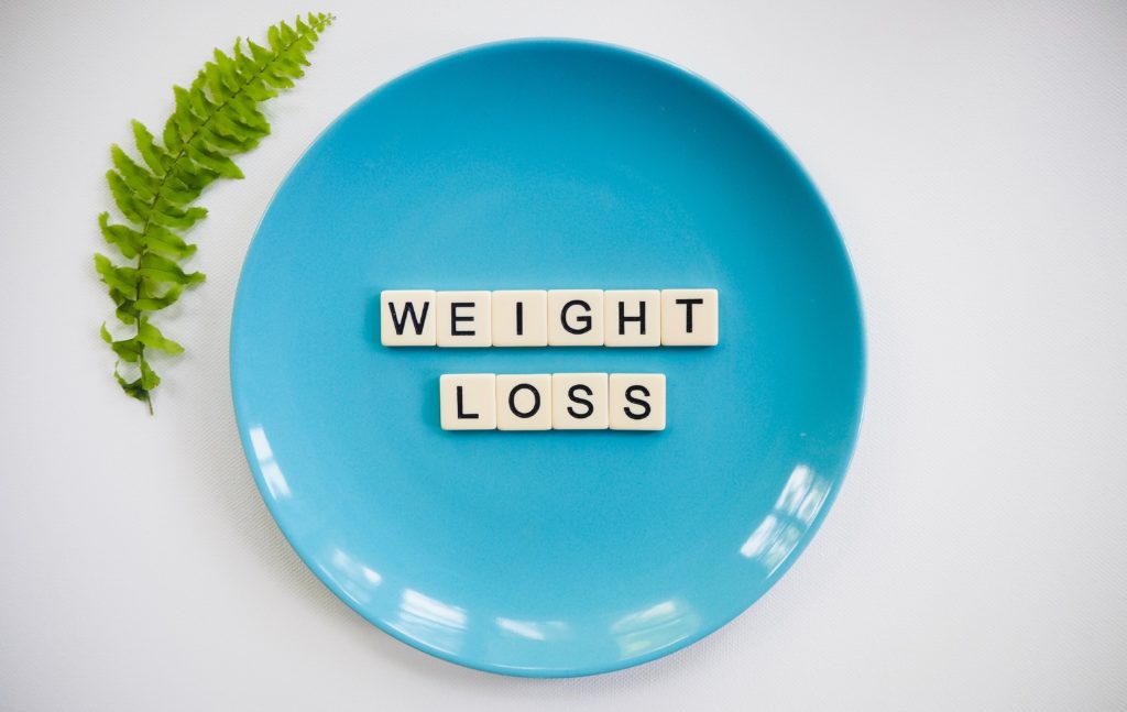 weight loss scrabble tiles on plate